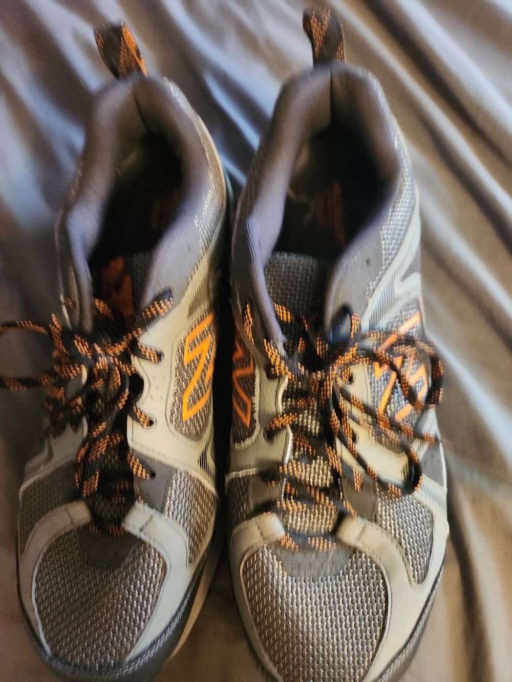 New Balance Men’s Gray Athletic Shoes with Orange Accents